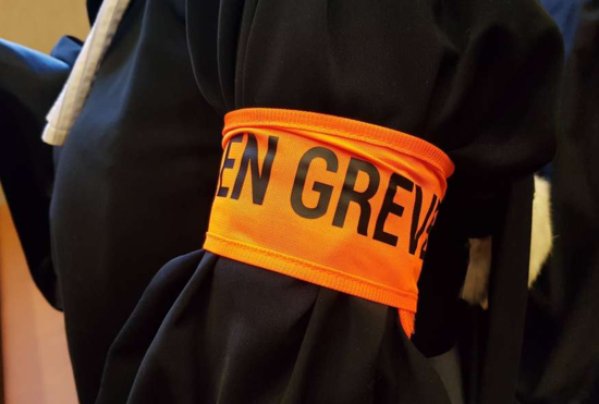 en grève